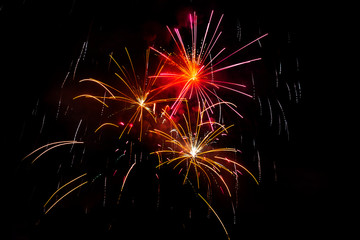 Awesome isolated Festive fireworks on a dark background. Can be used as wallpaper or background