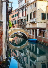 Parked boats. Beautiful Canal in Venice Italy
