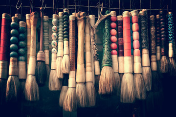Collection of calligraphy chinese brushes at the antique market in Shanghai, China