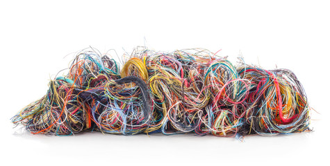 Colorful tangled threads isolated on white background. Closeup. - obrazy, fototapety, plakaty