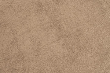 Brown leather close-up for background.
