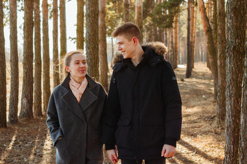 Guy with a girl walk in nature