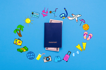 Passports and Banknotes of dollars and added icons of the Travel and Rest on the Blue background....