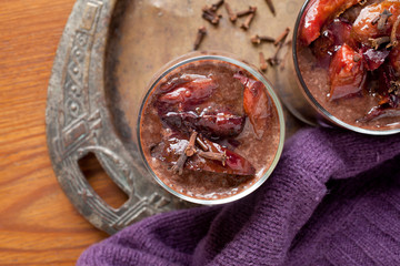 Chocolate smoothie -milkshake with plums and cloves