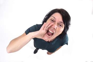woman putting a hand in mouth and is screaming on white background