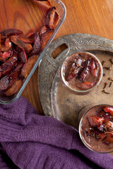 Chocolate smoothie -milkshake with plums and cloves