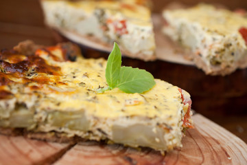 Piece of Vegetable pie with broccoli