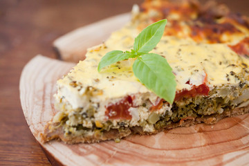Piece of Vegetable pie with broccoli