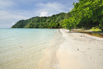 Tropical sandy beach on the Koh Chang island, Thailand.