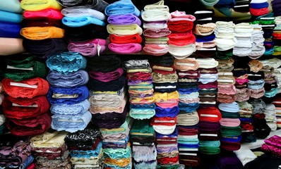 Shelf with a wide selection of colorful fabrics 