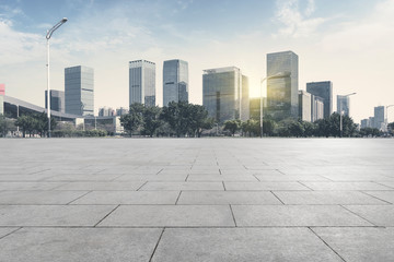 Urban skyscrapers with empty square floor tiles