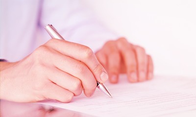 Businessman is signing a contract, business contract details