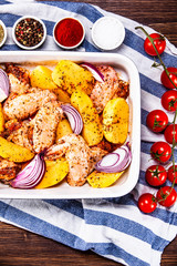 Raw chicken wings prepared for roasting