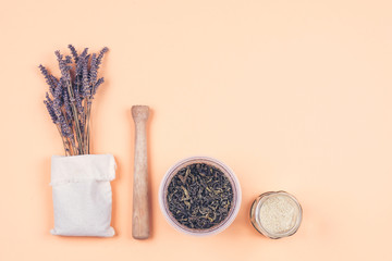 Eco styled lavander, seeds, pestle, flax bag and green tea composition.