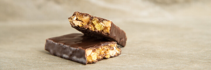 Muesli and cereal bar on marble stone background