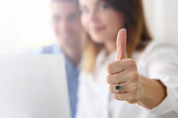 Female hand showing ok or approval sign with thumb