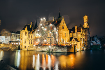 Fototapeta na wymiar famous landmark near the river in Bruges, at night, Belgium