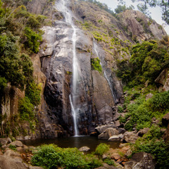 The waterfall. The waterfall with the mountains in the country of Sri Lanka