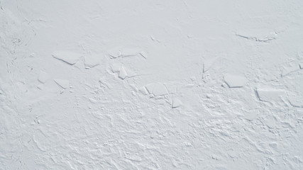 Clean snow texture. Winter background. View from above.