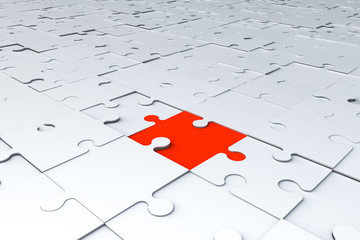 One Red Puzzle Piece on White Jigsaw Puzzle