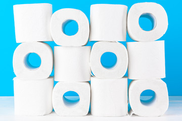 Toilet paper. Close up shot on blue background