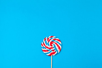 Colorful lollipop. Flat lay. Minimal concept.