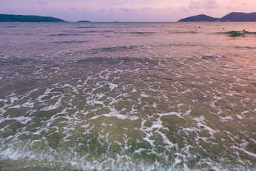 beach with sofe wave in a sunset time