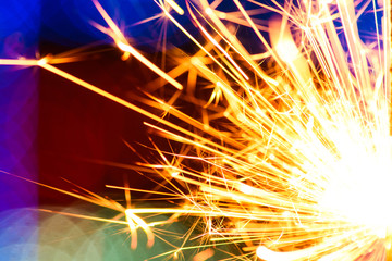 Sparks in the dark. Sparks. Christmas and New Year time. Magic light