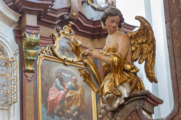 PRAGUE, CZECH REPUBLIC - OCTOBER 12, 2018: The carved polychrome baroque statue of angel from the...