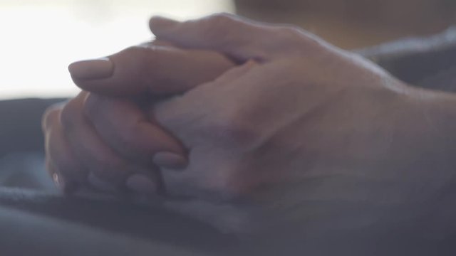 Closeup of tender hands of a mature couple. Family relationships. S-log, ungraded