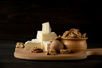 Cheese camembert or brie with walnut kernels