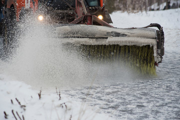 Snow removal from the streets with a special machine