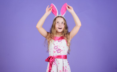Holiday bunny girl with long bunny ears. Child cute bunny costume. Playful baby celebrate easter. Spring holiday. Happy childhood. Ready for Easter day. Easter activities for children. Happy easter