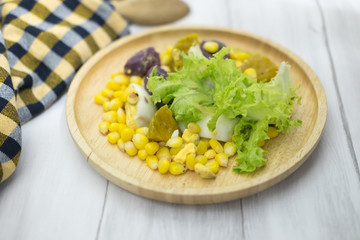 Healthy salad (lettuce, pumpkin, corn,yam and boiled egg)