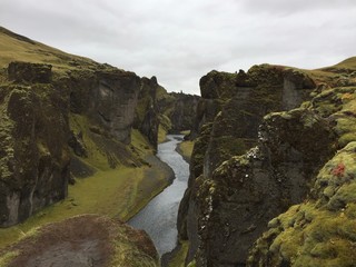 Fjaðrárgljúfur is a canyon in south east Iceland. The Fjaðrá river flows through it. The canyon has steep walls and winding water. It is located near the Ring Road, not far from Kirkjubæjarklaustur.