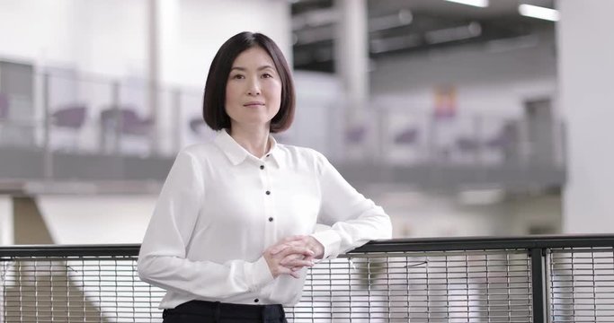 Portrait of Japanese businesswoman in corporate office
