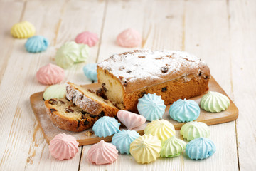 Delicious homemade cake with raisins on a light wooden background. close-up. rustic. copy space.