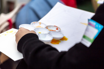painting courses. student drawing at the park