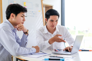 Young man designers planning work together on website ux app development.