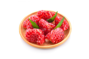 Ripe pomegranate piece isolated on white background