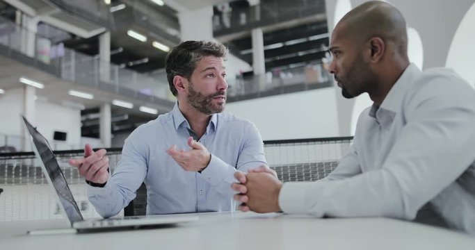 Male Business Executives In A Meeting