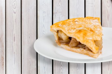 Freshly baked cake on white background