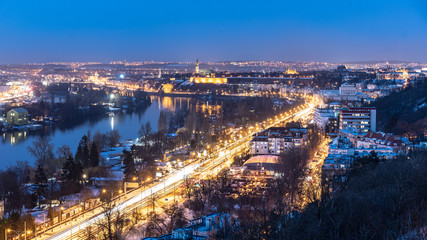 Fototapeta na wymiar Vltava River and Vysehrad in Podoli. Winter evening view from Branik rocks. Prague, Czech Republic