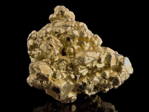 Piece of Pyrite specimen (iron pyrite, fool's gold) stone isolated on black background. Golden Pyrite macro close-up