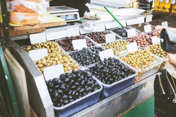 fresh healthy green and black olives for sale
