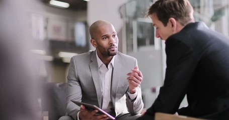 African American businessman in a corporate meeting - Powered by Adobe