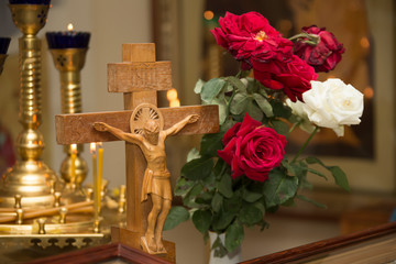 Wooden cross with jesus. Decorated Church Altar