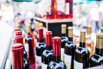  view of wine bottles in rows for sale