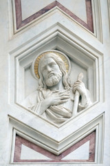 Apostle, relief on the facade of Basilica of Santa Croce (Basilica of the Holy Cross) - famous Franciscan church in Florence, Italy