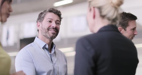 Business executives meeting at a conference - Powered by Adobe